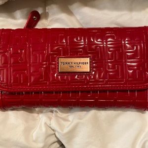 Tommy Hilfiger wallet. Red. Brand new. Only used this wallet one time.